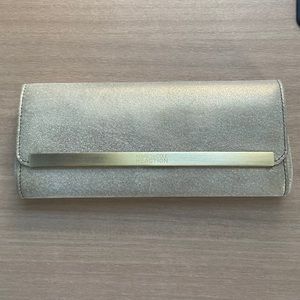 Kenneth Cole Reaction clutch